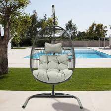 Zeus Ruta Metal Outdoor Patio Swing Egg Chair Natural Color Wicker With Beige Cushion