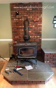 painted brick wood stove fireplace