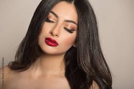 makeup dark haired woman red lipstick