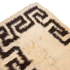 vine flokati wool rug with greek key