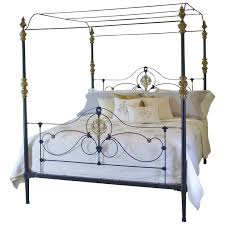 cast iron and brass four poster bed