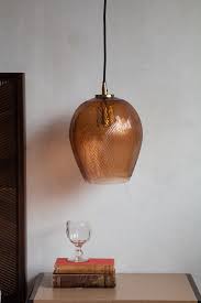 amber tinted glass pendant light with