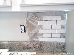 Once you have the holes, put the nails in accordingly. How To Install A Backsplash The Budget Decorator