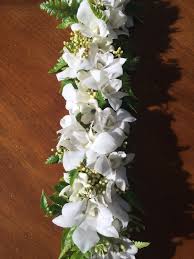 Pressreader san francisco chronicle late edition 2018 09. White Orchid Haku Lei Wedding Flowers Tahiti Wedding Wedding Hairstyles With Veil
