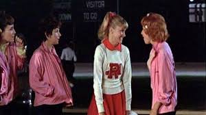 Grease is a 1978 american musical romantic comedy film based on the 1971 musical of the same name by jim jacobs and warren casey. The Wig Style Cheerleadeuse Sandy Olivia Newton John In Grease Movie