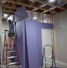 Flood Installing Purple Xp Drywall