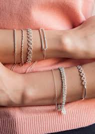 Silver bracelets add a timeless touch to any woman's wrist, match many outfits and fashions, and are appropriate for a range of situations.choose a single sterling silver bracelet to wear every day, or. Silver White Gold Bracelets Astley Clarke