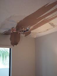 water damaged popcorn ceiling repair