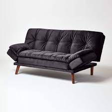 bailey velvet sofa bed with armrests black