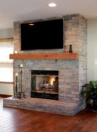 Rustic Mantel And Whitewashed Brick