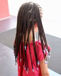 Once you reach the opposite ear, you can stop picking up strands of hair to interweave into your braid, and simply continue plaiting your hair until you reach the end. 10 Creative Box Braids With Beads You Should Try Hairstylecamp