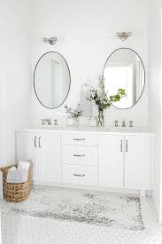To discover oval width take the widest part of the frame starting from we have the world class assets for bathroom decor. Oval Black Mirrors Over White Shaker Dual Bath Vanity Transitional Bathroom