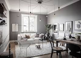 gray walls in the living room and brick