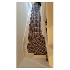 installing striped carpet to stairs