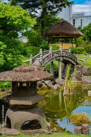 Cute Stone Bridge In Japanese Garden