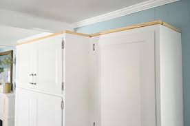 install crown molding on cabinets