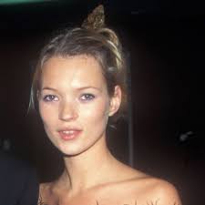90s kate moss in a feather trimmed lbd