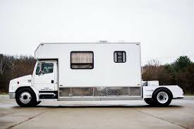 this freightliner toter home is both rv