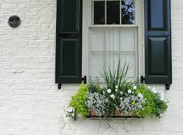 This wooden window flower box is a perfect match for the french windows. Window Box Plants Unicorn Windows