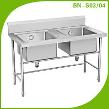 One side of the sink (typically the side facing the kitchen) is flattened and the opposite side (where the faucet sits) is rounded. Factory Price Restaurant Stainless Steel Double Bowl Vegetable Kitchen Sink View Vegetable Kitchen Sink Cosbao Product Details From Foshan Nanhai Xiaotang Baonan Kitchen Equipment Factory On Alibaba Com