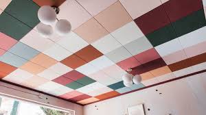 Find out how to install insulation above your suspended ceiling with jcs. How To Mask Ugly Drop Ceiling Tiles Using Just Paint Architectural Digest