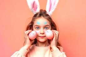 bunny ears holding easter eggs