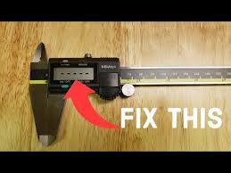 how to fix mitutoyo calipers dashes