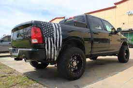 Distressed american flag truck tailgate wrap black and grey 66 x 26. Black And White Flag Graphic Truck Wraps Graphics Truck Decals American Flag Decal Vinyls