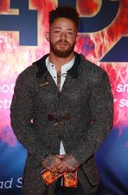 Uk reality star, ashley cain, at a movie premiere in 2016. 9qrsnqctoby5hm