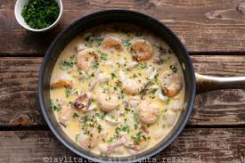 mixed seafood in a creamy garlic wine