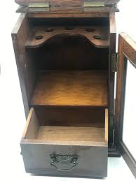 antique solid oak smokers cabinet