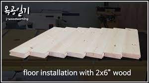 diy floor installation with 2x6 wood