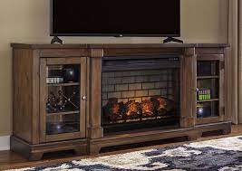 flynnter tv stand fireplace brown