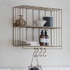 antique brass wall shelf with hooks