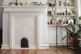 how to tile a faux fireplace mantel