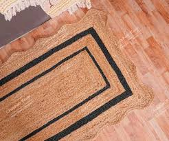 yellow border hand braided jute rug