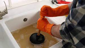 how to fix a slow or clogged drain