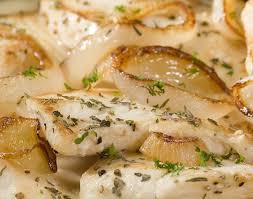 fish baked in creamy milk sauce with