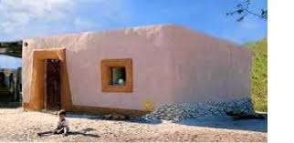 a house built by mud brick and straw a