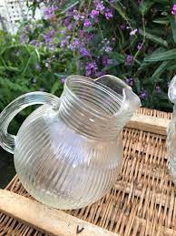 depression glass water pitcher a