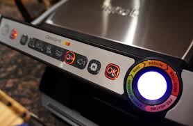 The optigrill features a powerful 1800 watt heating element, user friendly controls ergonomically located on the handle, and die cast aluminum plates with. T Fal Optigrill