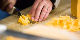Image result for cutting cheddar cheese