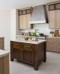 At minimum, an island should be 4 feet long and a little more than 2 feet deep, but it must also have room for people to move and work the most common scheme is to install a downdraft fan behind the cooktop; Kitchen Island Vs Peninsula Which Layout Is Best For Your Home Designed