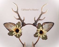 I just kept adding more and more flowers. Deer Antler Headbands Halloween Costumes Rustic By Woodnhooks Deer Antlers Headband Antler Headband Halloween Headband