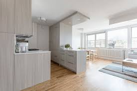 The most common size is 12 inches deep, yet 15 inches is becoming more if you need an unusually sized cabinet, consider hiring a carpenter or cabinetry company to construct one that fits the space in your kitchen. 7 Full Wall Kitchen Cabinets An Expanding Trend Sweeten Com