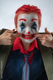 clown white face red clown mouth blue