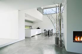 Polish the concrete floors using a coarse grit abrasive disc. Concrete Flooring A Guide To Polished Concrete Floors Costs And More Real Homes