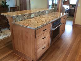 When building a kitchen island using base cabinets, experts recommend permanently fixing the how to anchor a diy kitchen island to the floor. Custom Birch Cabinet Island With Granite Top Build It Right Carpentry
