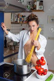 Nude Woman Cooking Spaghetti Stock Photo, Picture and Royalty Free Image.  Image 38004369.