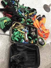 suitcase filled with plane equipment